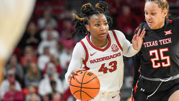 Razorbacks' Makayla Daniels drives against Texas Tech in the WNIT on Friday night at Bud Walton Arena.
